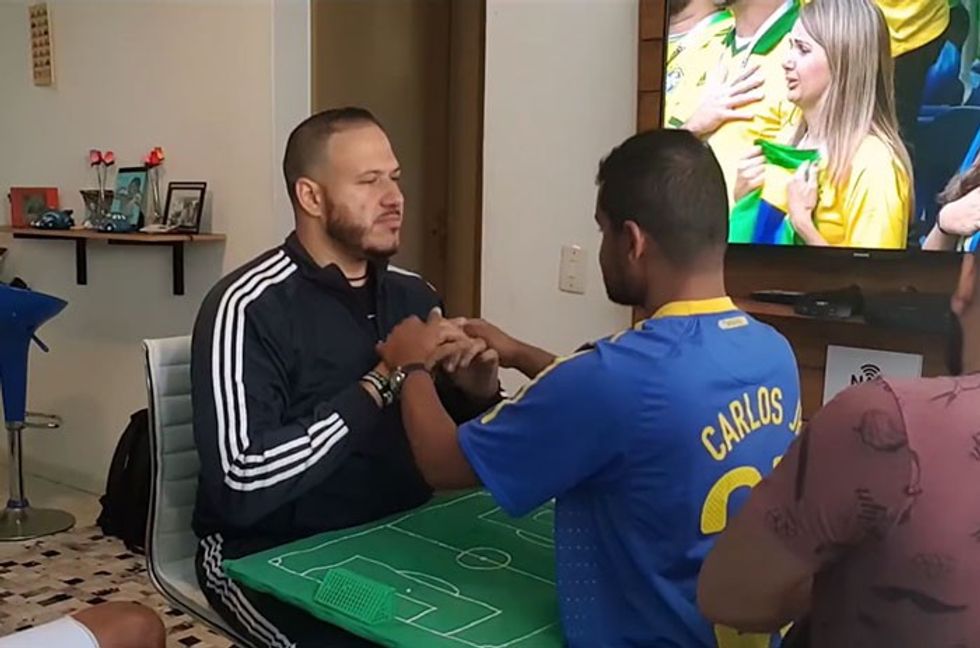 Hero of the Week: Brazilian Interpreter Goes Viral for Helping Deaf and Blind Friend Enjoy the World Cup