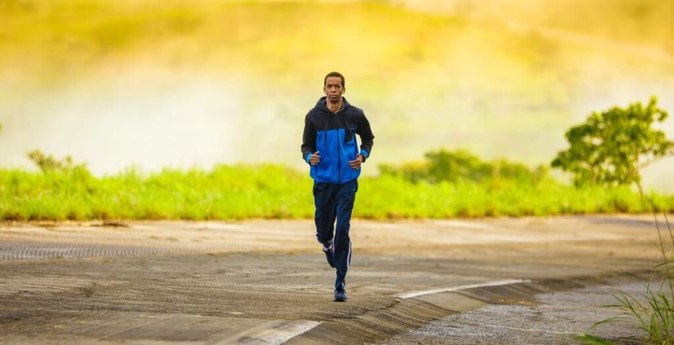 young man goes on run outside