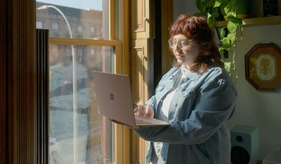 young woman looks online