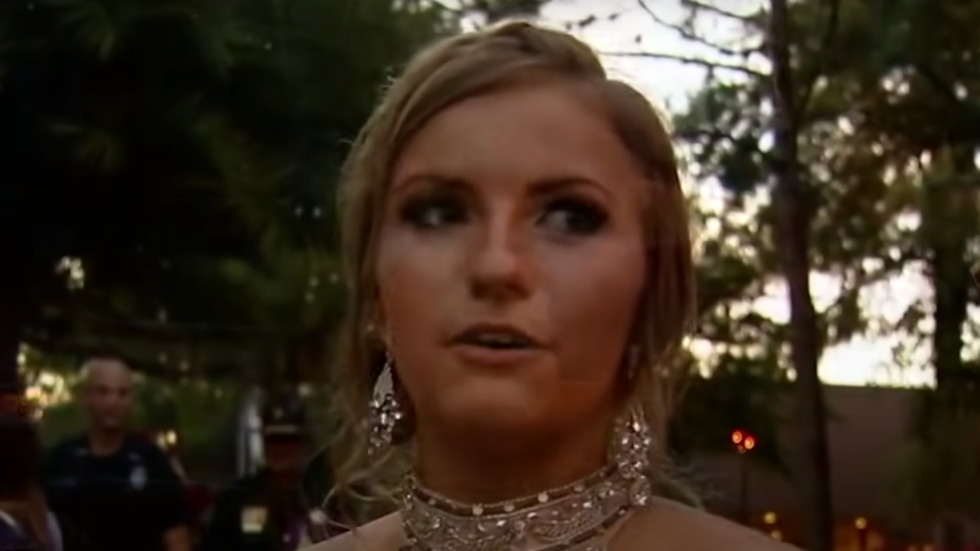 young woman wearing a sparkly necklace and earrings