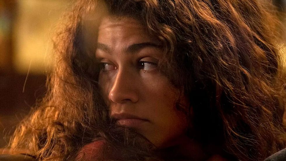Zendaya as Rue looking over her shoulder in Euphoria