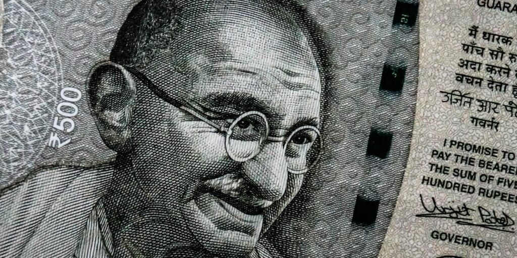 Gandhi on the Indian rupee banknote by Ishant Mishra on Unsplash