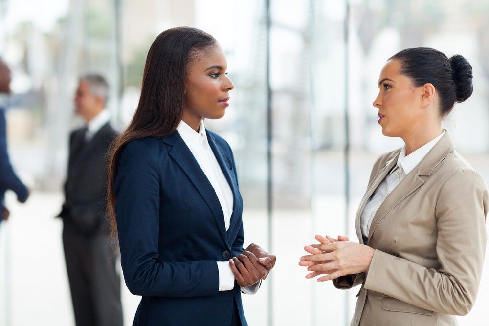 female-coworkers-tense-conversation