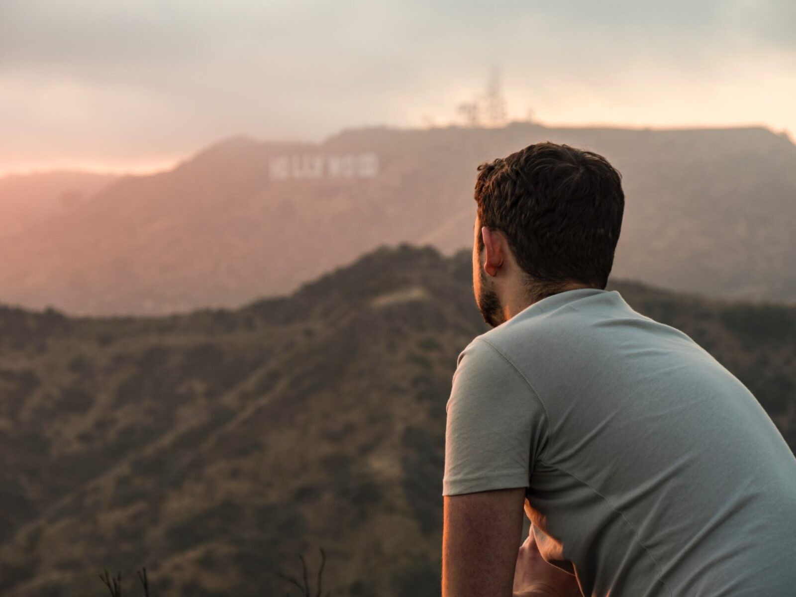 man-looking-out-towards-Hollywood-sign