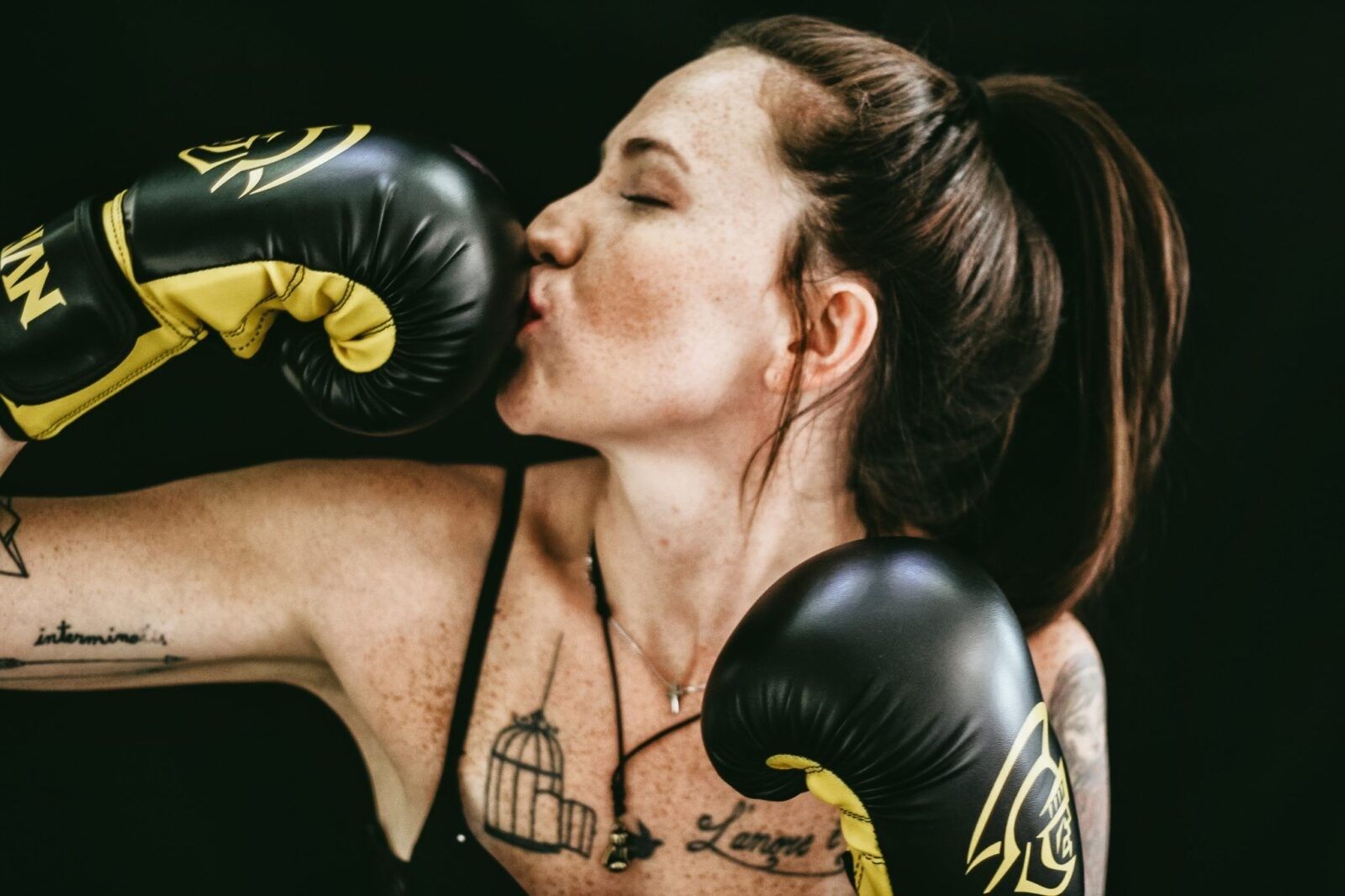 woman-kissing-boxing-glove