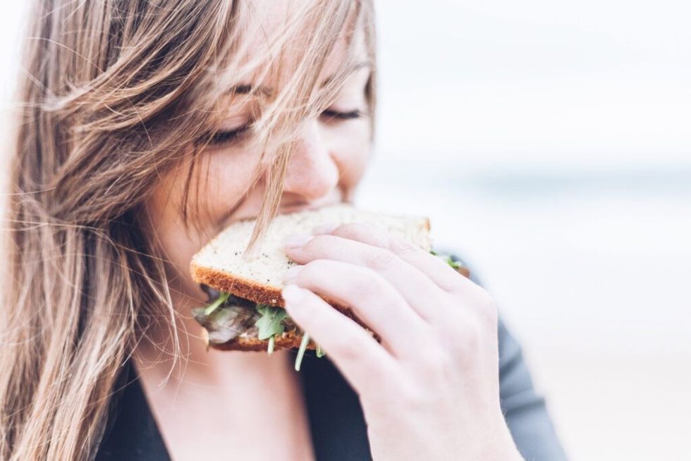 Woman-eating-a-sandwich