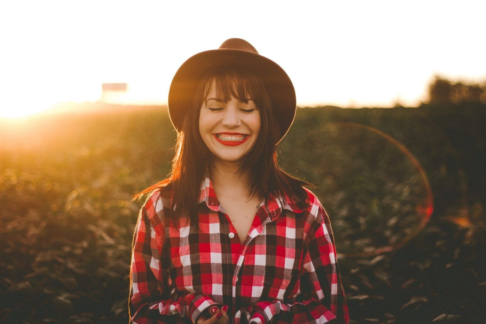 Woman-smiling-in-a-field