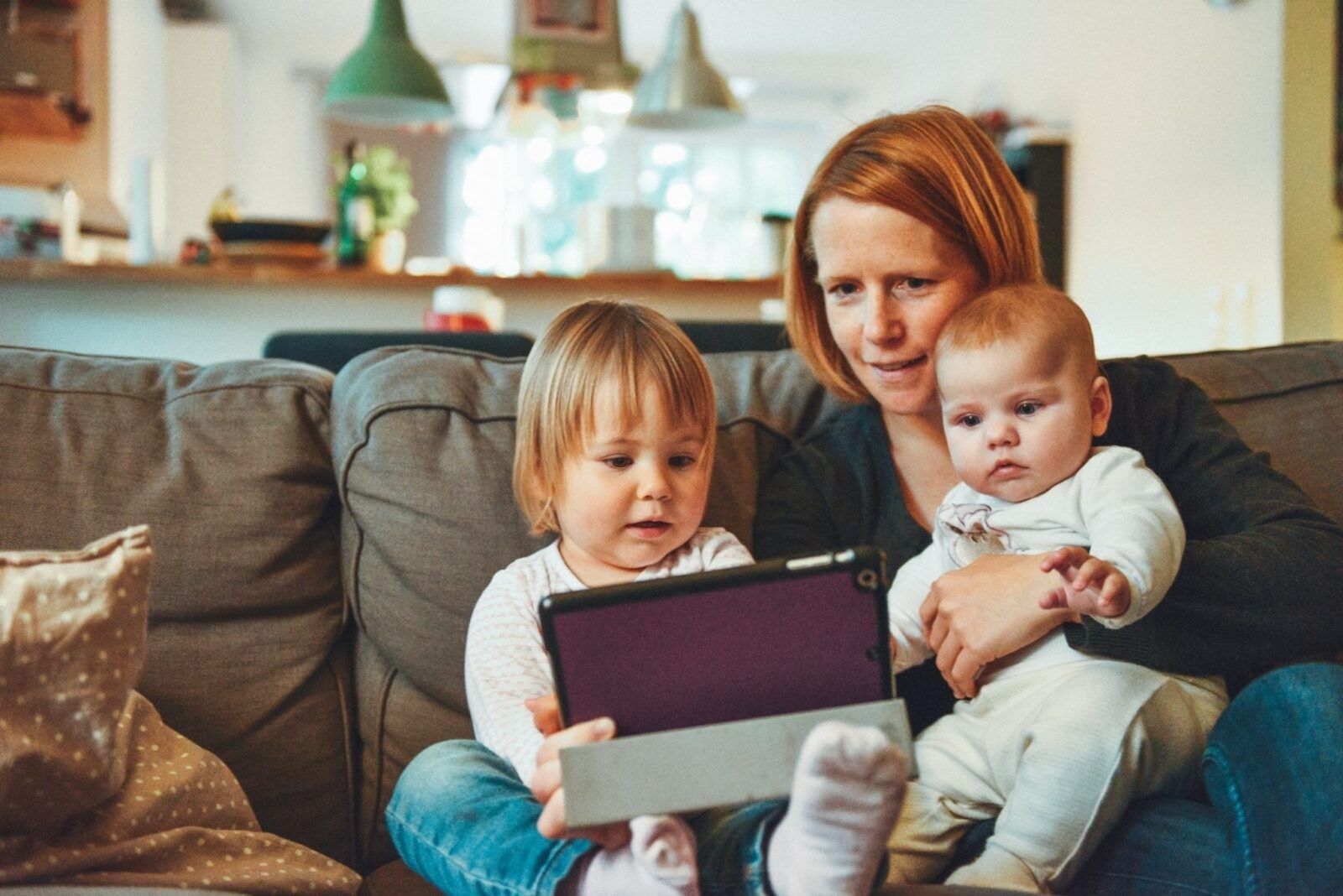 Woman-on-a-tablet-with-kids