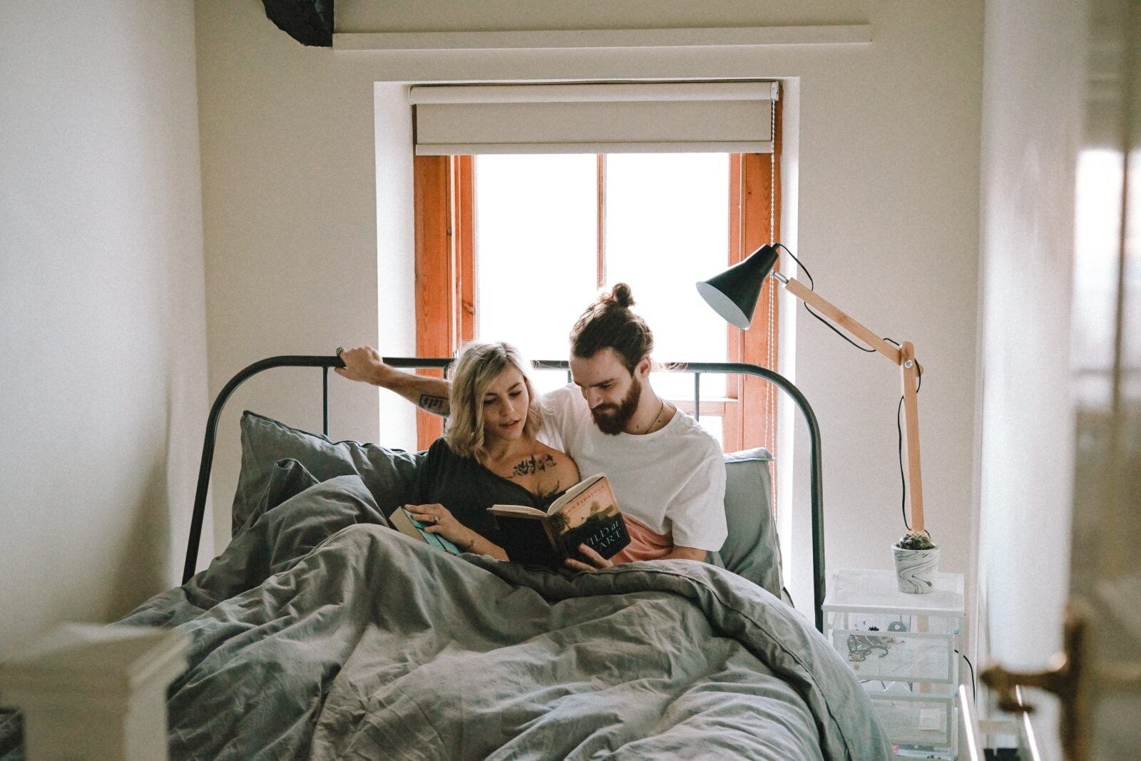 Couple-reading-in-bed