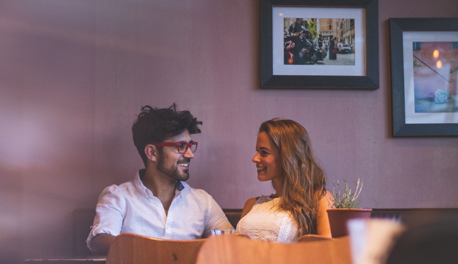 couple smiling at dinner