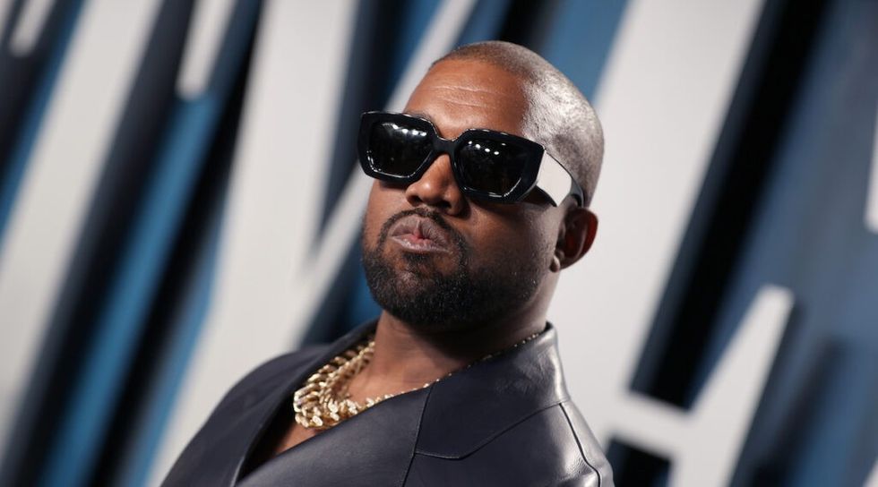 Kanye West wearing dark sunglasses