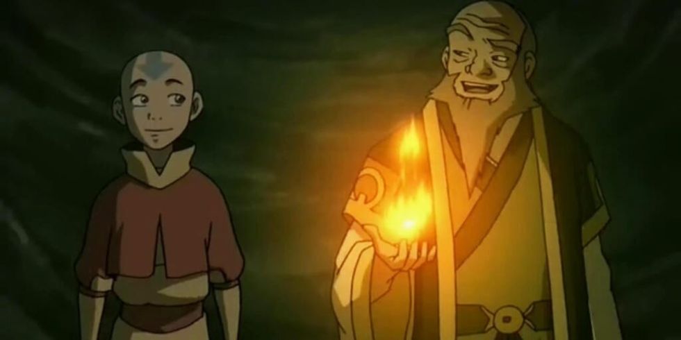 Uncle Iroh and Aang in dark tunnel