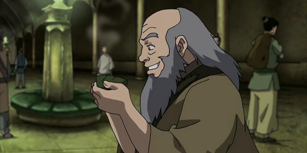 Uncle Iroh happy holding cup of tea