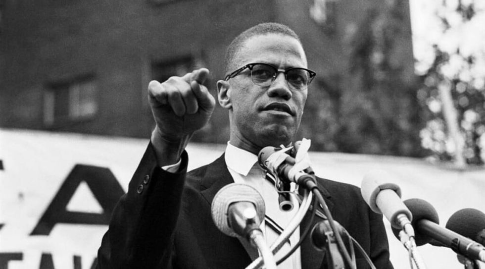 Malcolm X delivering speech
