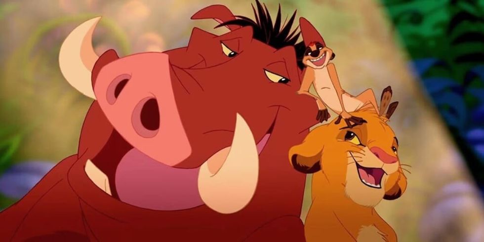Pumbaa, Timon, and a young Simba from The Lion King