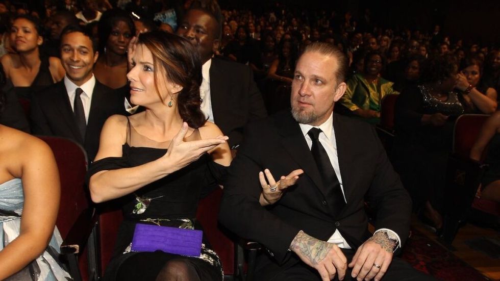 Sandra Bullock and Jesse James seated at awards show