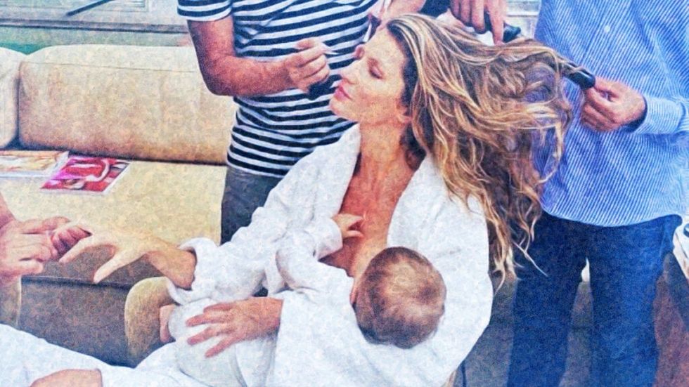 Celebrity breastfeeding while getting makeup done