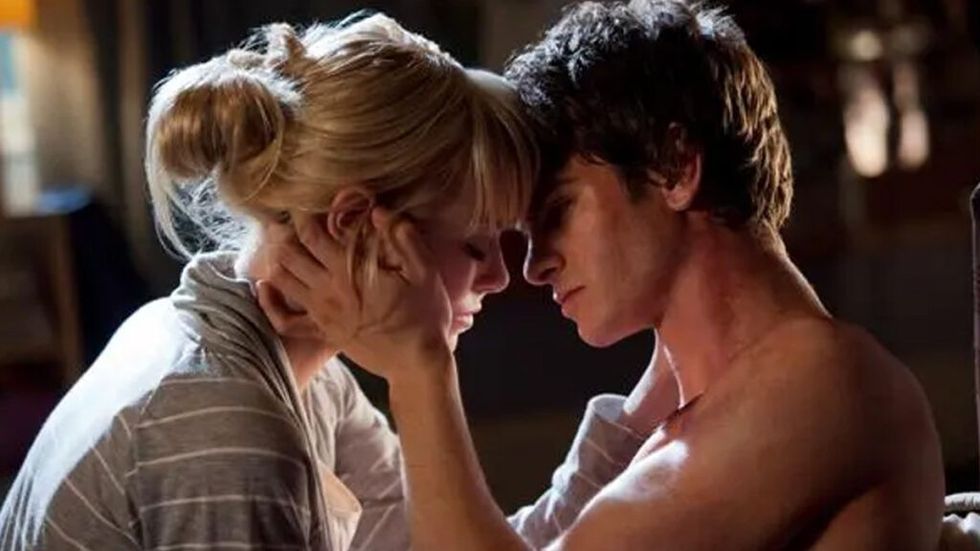 Andrew Garfield Spider-Man and Emma Stone Gwen Stacy in steamy kissing scene