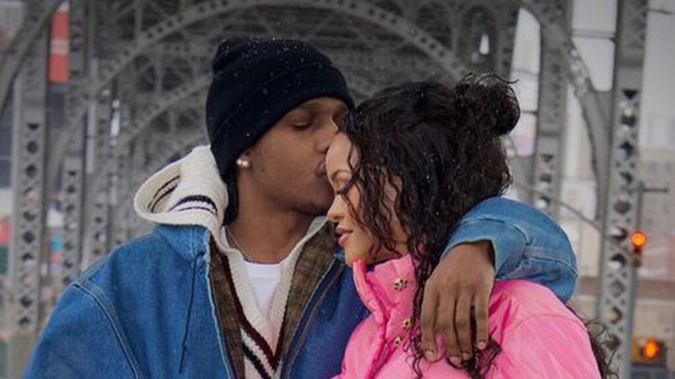 Asap Rocky kissing Rihanna on a New York bridge