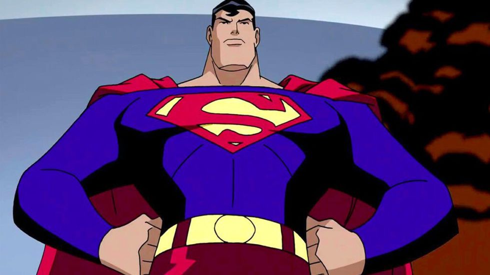 Cartoon Superman in Justice League Unlimited with hands on hips looking angry