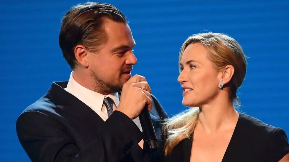 Leonardo DiCaprio and Kate Winslet talking on-stage