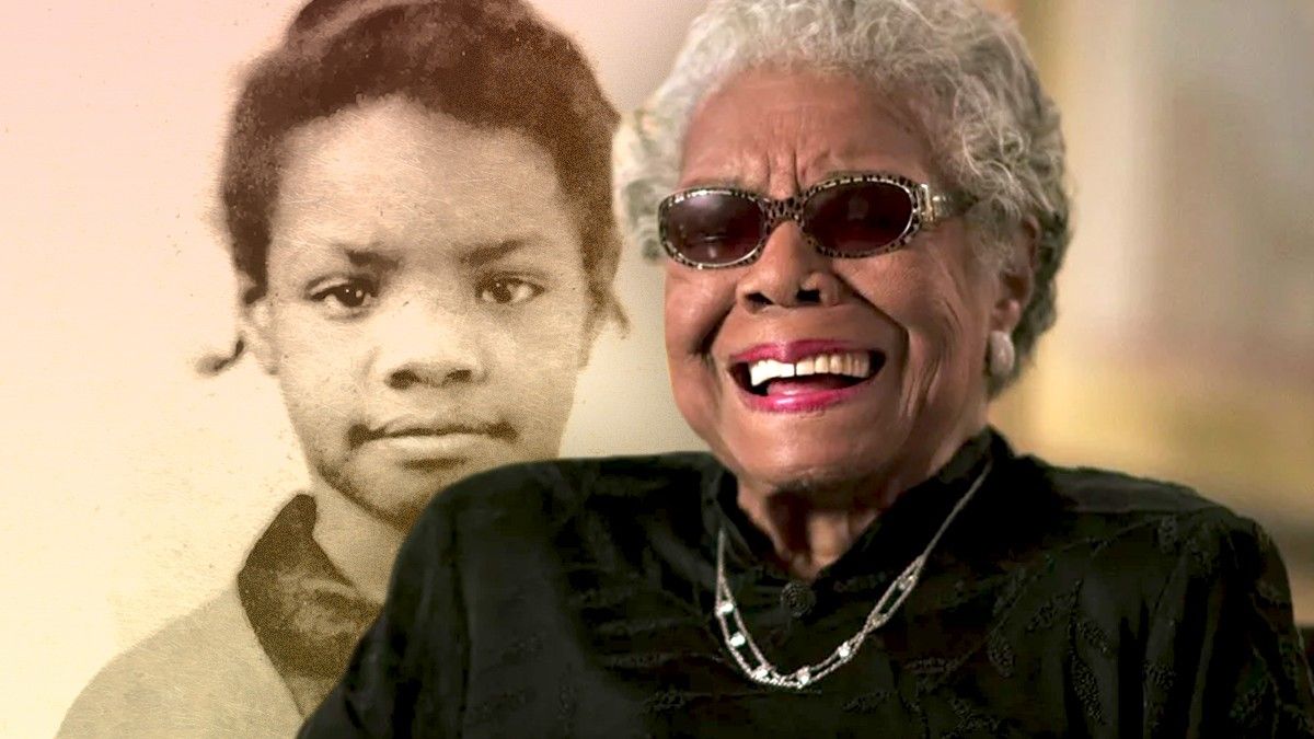 Maya Angelou smiling in front of childhood image