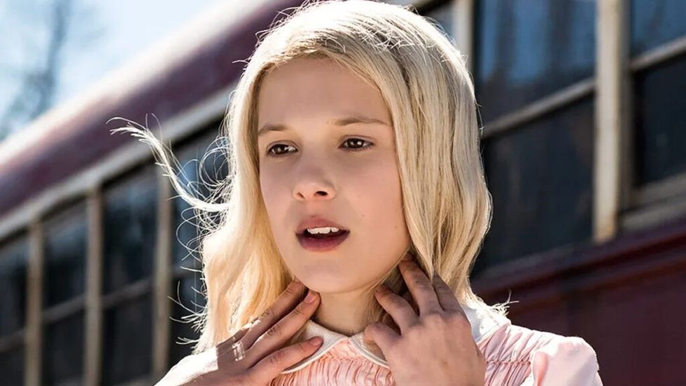 Millie Bobby Brown as Eleven in Stranger Things wearing a blonde wig costume