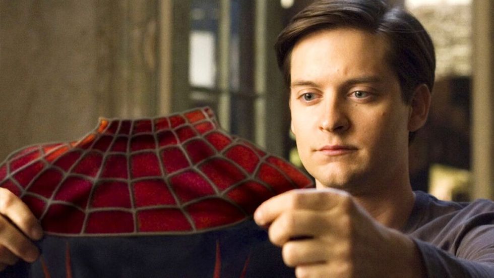 Peter Parker holding the Spider-Man suit in Spider-Man 3