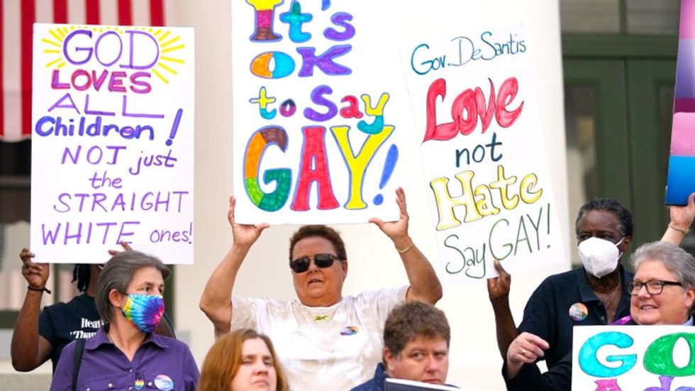 Protesters marching against Florida Don't Say Gay Bill
