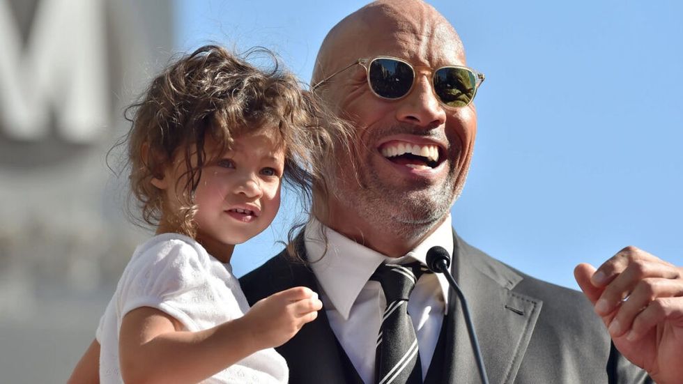 The Rock and his child