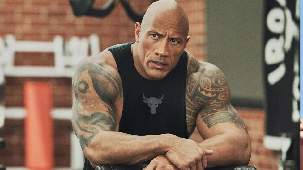 The Rock takes a break at the gym