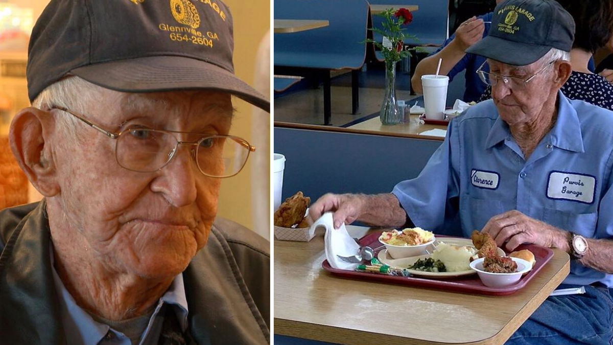 an elderly man eating food at a restaurant