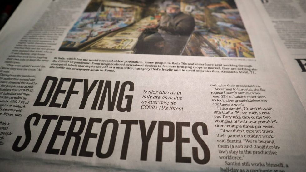 newspaper with "defying stereotypes" as a headline