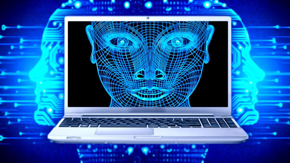 AI wireframe face inside a laptop computer