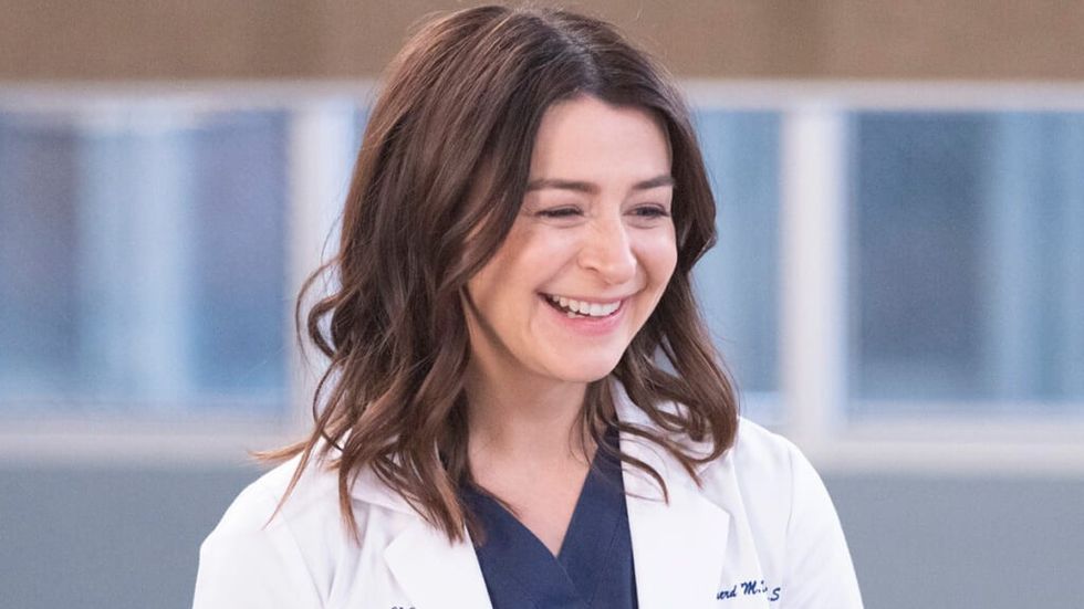 Amelia Shepherd smiling on-set at Grey's Anatomy
