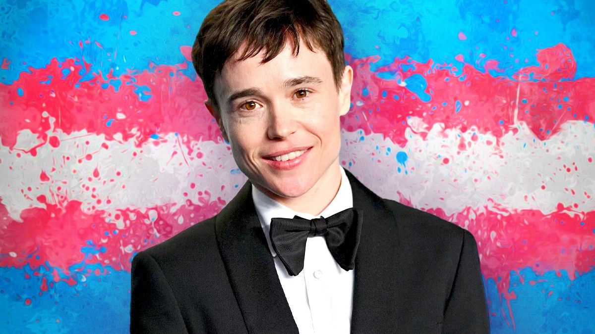 Elliot Page in a tux in front of a Trans Pride background