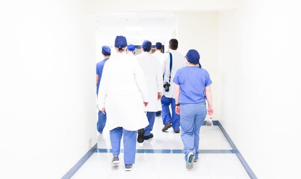 interior of a hospital attendants walking