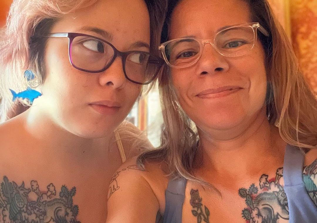 mom and daughter with matching tattoos