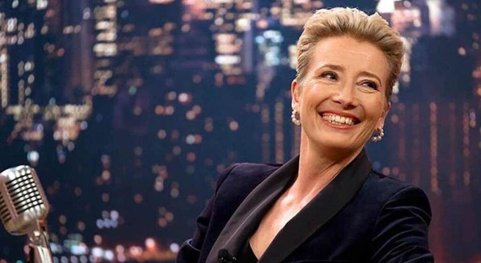 Emma Thompson smiles during a late night interview.