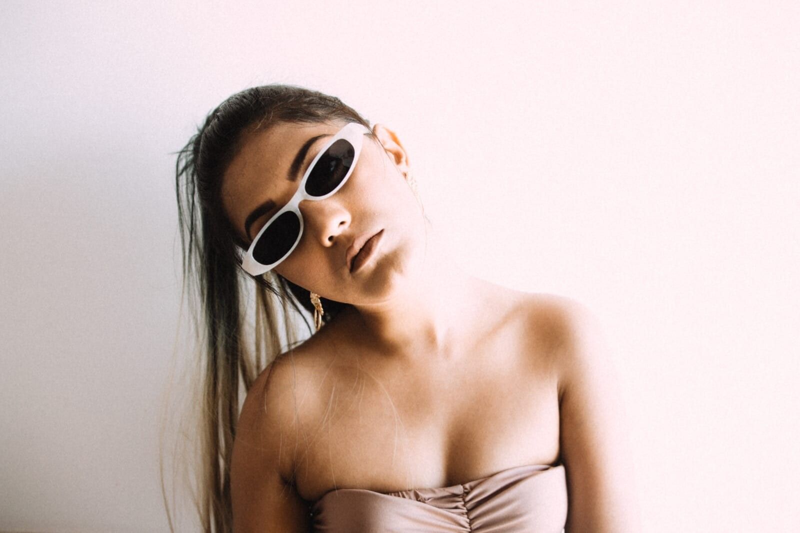 hip young woman in shades