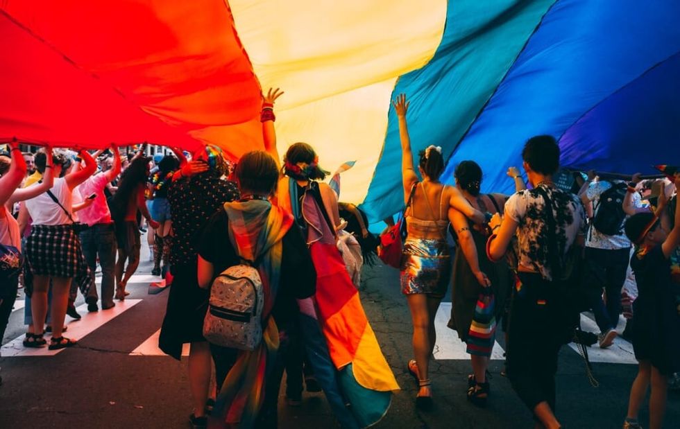 lgbt flag people marching