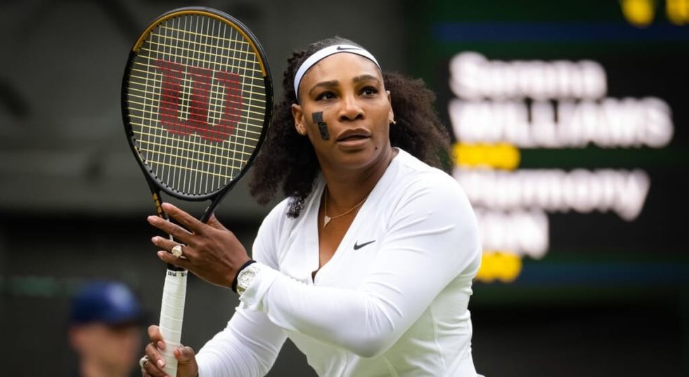 Serena WIlliams playing tennis at Wimbledon 2022