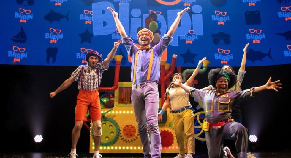 Blippi the Musical - Clayton Grimm singing on stage