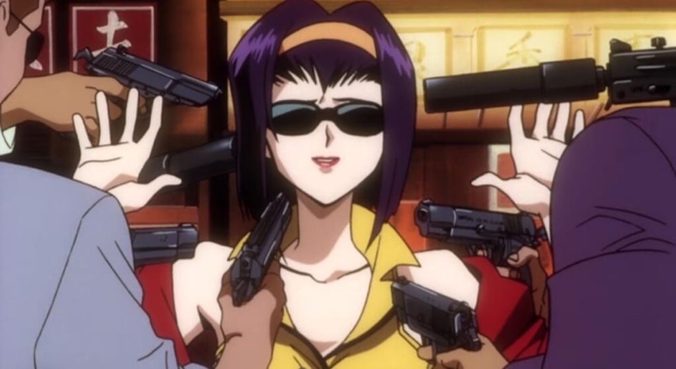 Faye Valentine with guns pointed at her head