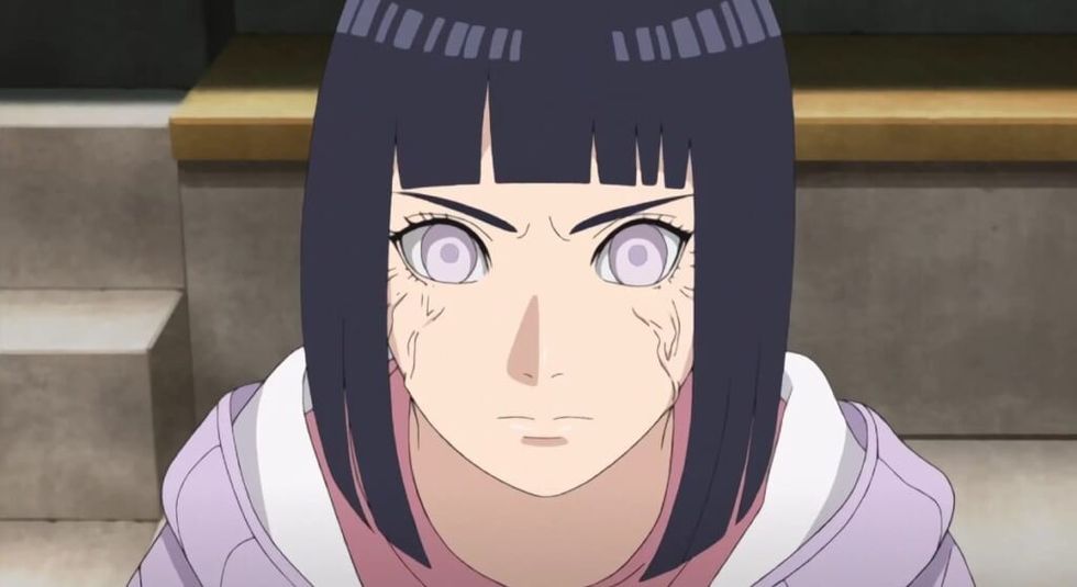 Naruto Hinata Uzumaki looking at the camera while crying.