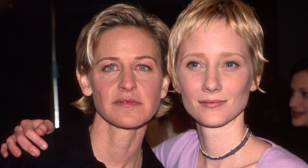 Young Anne Heche posing with Ellen Degeneres while  they were a couple.