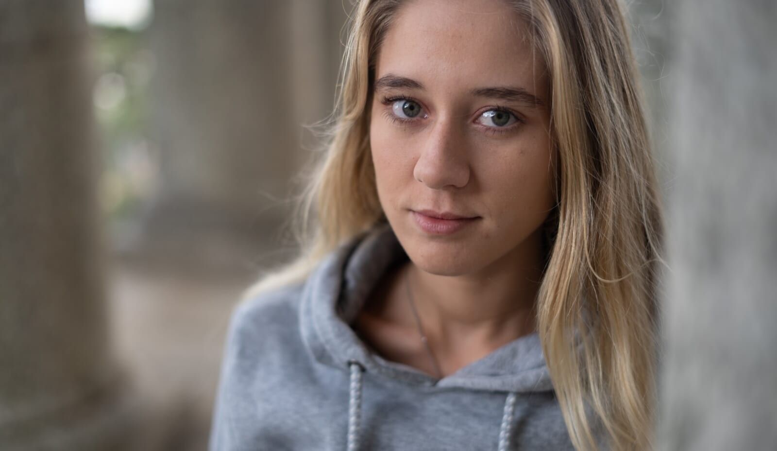 young woman wearing hoodie