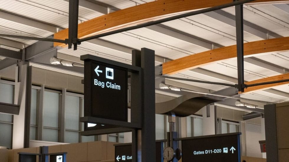 sign at the airport saying "bag claim"