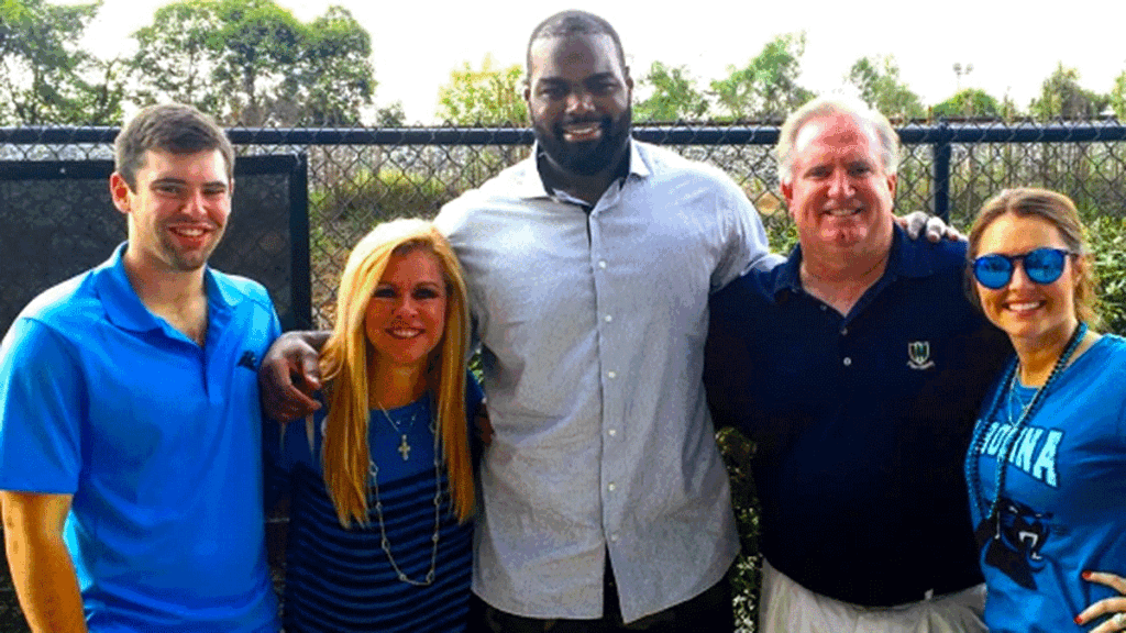 The real Michael Oher, with the Tuohy family, in 2016