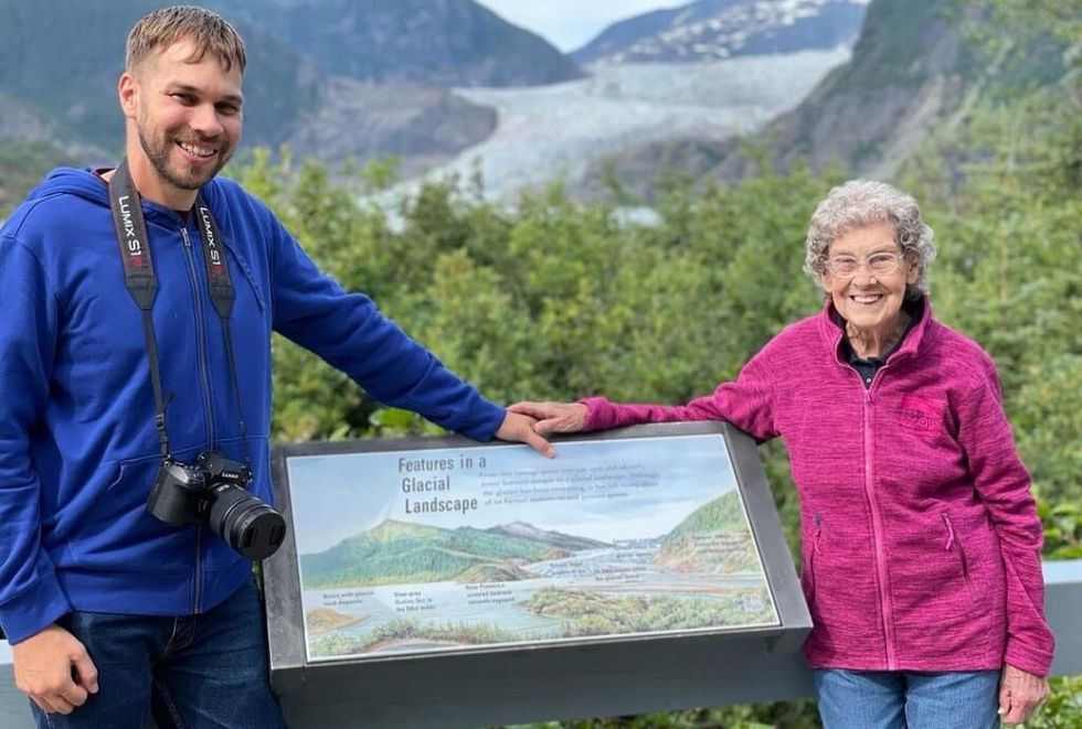 grandson and grandma pose on their national parks journey